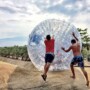 Conquer the Heights: The Thrill of Glass Bridges, Zip Biking & Zorbing!